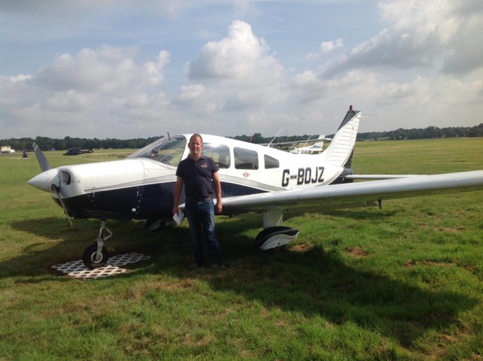 Paul, a pilot using Wingly, next to his aircraft